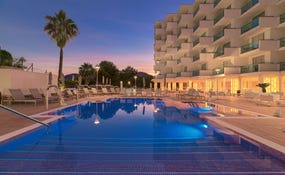 Hotel and swimming pools general night view